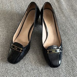 Prada block heels patent leather shoes.